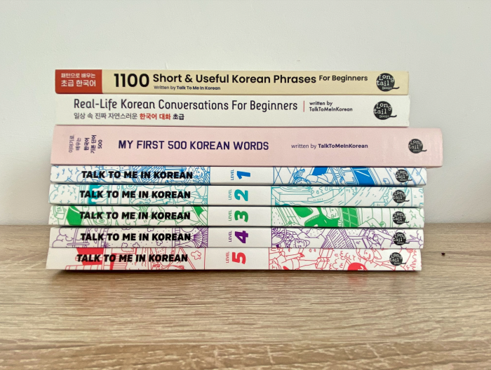 Stack of Korean books from Talk To Me In Korean. 